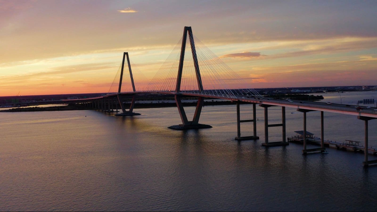 Aerial drone footage of the Ravenel Bridge at sunset, shot by Boda Studios near Charleston and Summerville
